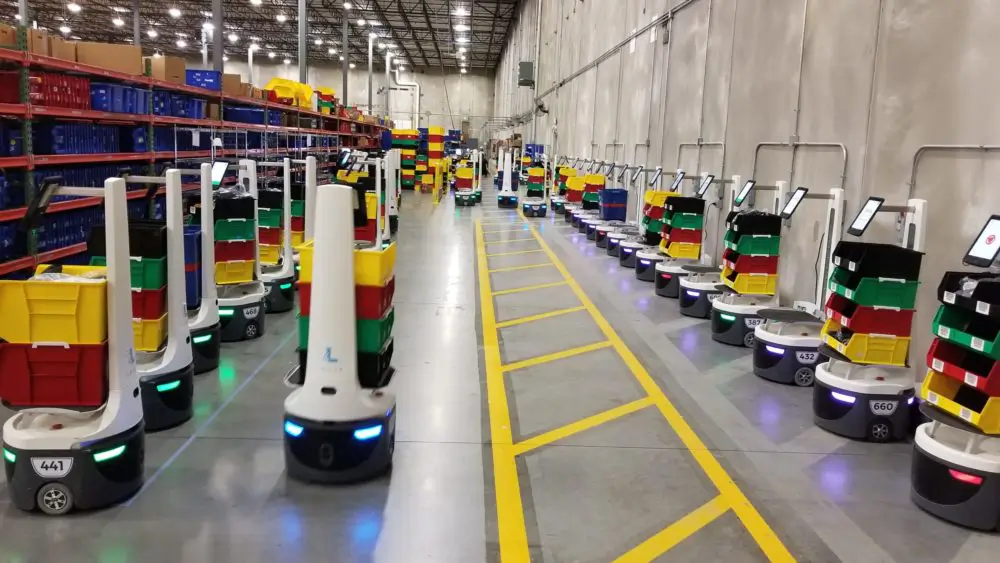Locus Robotics' AMRs navigate a warehouse
